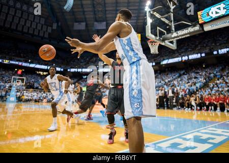 UNC Guard Nate Britt (0) passes the ball to UNC Guard Kenny Williams (24) during the NCAA Basketball game between the Fairfield Stags and the North Carolina Tar Heels at the Dean E. Smith Center on November 15, 2015 in Chapel Hill, North Carolina. Jacob Kupferman/CSM Stock Photo