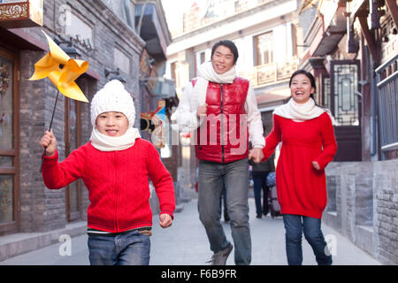 Family having fun in Hutong Stock Photo