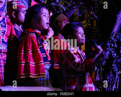 The Lumad children sings a very meaningful message. The Lumad peoples are a group of indigenous people of the southern Philippines. It is a Cebuano term meaning 'native' or 'indigenous'. The term is short for Katawhang Lumad (literally 'indigenous peoples'), the autonym officially adopted by the delegates of the Lumad Mindanao Peoples Federation (LMPF) founding assembly on 26 June 1986 at the Guadalupe Formation Center, Balindog, Kidapawan, Cotabato, Philippines. It is the self-ascription and collective identity of the indigenous peoples of Mindanao. (Photo by Josefiel Rivera/Pacific Press) Stock Photo