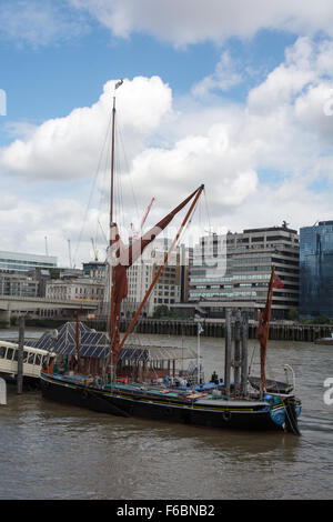 The Thames sailing barge Ardwina moored in the Pool of London. She has been fully restored and can be used for private events. Stock Photo