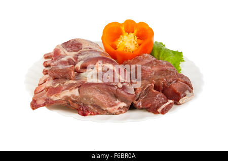 semi-finished products made of wild boar meat on the plate, isolated on white background Stock Photo