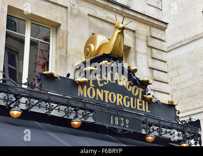 Restaurant L'Escargot sign, with golden snail, Rue Montorgueil, Paris, Ile de France, France Stock Photo