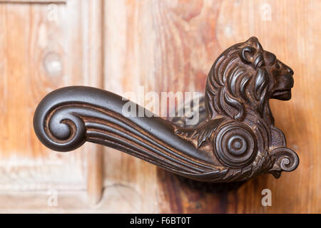 Doorknob, in the shape of a lion, at the Church of the Assumption in Burg bei Tengling, Rupertiwinkel, Chiemgau, Upper Bavaria Stock Photo