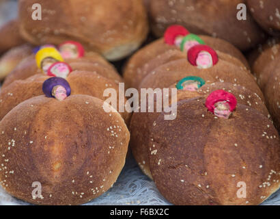 Traditional Mexican Bread called Bread of the Dead (Pan de Muerto) eaten during Day of the Dead festivities in Mexico. Stock Photo