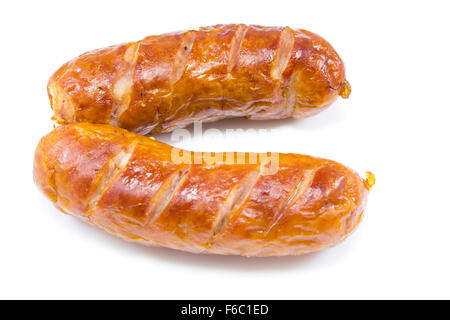 Two cooked sausages, side by side on white background Stock Photo