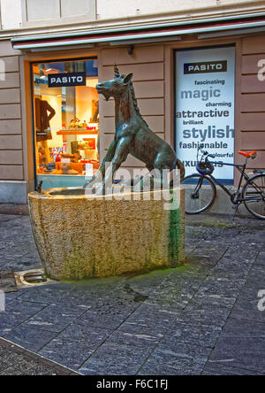 LUCERNE, SWITZERLAND - JANUARY 06, 2015: Unicorn statue in the street of Lucerne, Switzerland Stock Photo