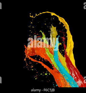 Colored paint splashes on black background Stock Photo