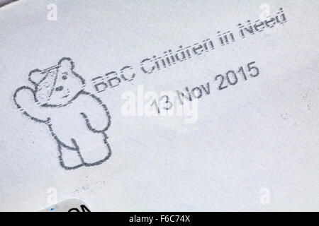 BBC Children in Need 13 Nov 2015 with Pudsey bear stamped on envelope Stock Photo