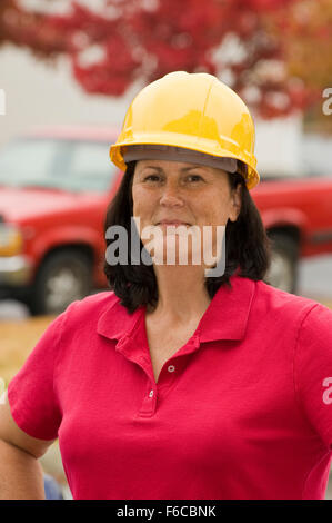 A Smiling Female Construction Worker Stock Photo