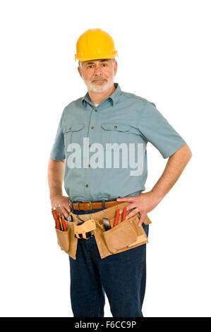 Mature Construction Worker With Tool Belt and Hard Hat Stock Photo