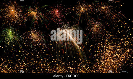 Beautiful colorful fireworks of various colors over night sky Stock Photo