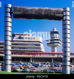 'Wolkentor' stainless steel arch by Heinrich Brummack 1975, Berlin-Tegel Otto Lilienthal airport terminal , Berlin, Germany Stock Photo