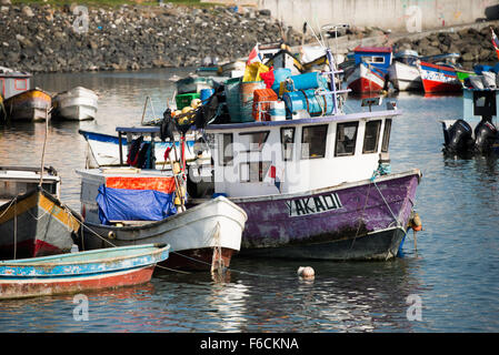 PANAMA CITY, Panama--Small wooden fishing boats on the waterfront of Panama City, Panama, on Panama Bay. Stock Photo