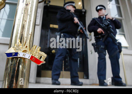 London, UK. 16th Nov, 2015. Armed police officers patrol outside the Embassy of France in London, UK, Monday, November 16, 2015.  An increased number of police with firearms training are to be made available in London after the Paris shootings. Credit:  Luke MacGregor/Alamy Live News Stock Photo