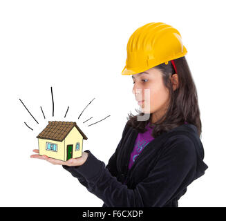 Little girl with yellow helmet and house in his hands on white background Stock Photo