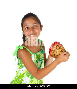 Little girl with basket of numbers for bingo on white background Stock Photo