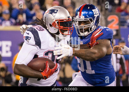 New York Giants' Eli Manning tries to get away from Denver Broncos' Robert  Ayers at MetLife Stadium in East Rutherford, New Jersey, Sunday, September  15, 2013. (Photo by Tyson Trish/The Record/MCT/Sipa USA