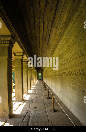 Angkor Wat Temple, Cambodia: A long gallery of bas relief sculpture depicting Vishnu overseeing the churning the ocean of milk. Stock Photo