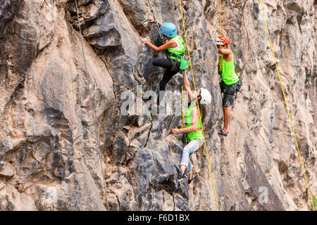 Banos, Ecuador - 30 November 2014: Basalt Challenge Of Tungurahua, Group Of Brave Climbers Climbing A Rock Wall In Banos Stock Photo