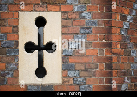 Worn and weathered brick wall with ventilation at Hampton Court in London England. Stock Photo