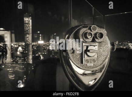 Binocular in New York City. Image in grunge and retro style. Stock Photo