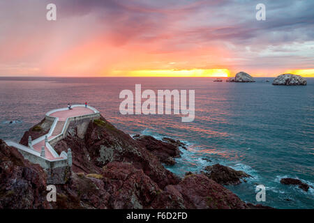 Brilliant sunset from the lookout near the lighthouse in Mazatlan, Sinaloa, Mexico. Stock Photo