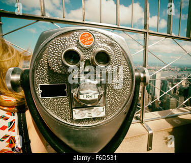 Coin operated binoculars with vintage effect, top of the empire state building, new york.
