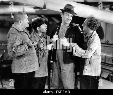 RELEASE DATE: October 20, 1933. MOVIE TITLE: Meet the Baron. STUDIO: Metro-Goldwyn-Mayer (MGM). PLOT: . PICTURED: CURLY HOWARD as Janitor, MOE HOWARD as Janitor, TED HEALY as Head Janitor and LARRY FINE as Janitor. Stock Photo