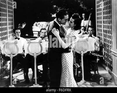 RELEASED: Apr 21, 1937 - Original Film Title: I Promise to Pay. PICTURED: CHESTER MORRIS, HELEN MACK. Stock Photo