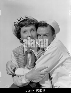 RELEASE DATE: December 30, 1949. MOVIE TITLE: On the Town. STUDIO: Metro-Goldwyn-Mayer (MGM). PLOT: Three sailors - Gabey, Chip and Ozzie - let loose on a 24-hour pass in New York and the Big Apple will never be the same! Gabey falls head over heels forMiss Turnstiles of the Month (he thinks she's a high society deb when she's really a 'cooch dancer at Coney Island); innocent Chip gets highjacked (literally) by a lady cab driver; and Ozzie becomes the object of interest of a gorgeous anthropologist who thinks he's the perfect example of aprehistoric man. Wonderful music and terrific shot Stock Photo