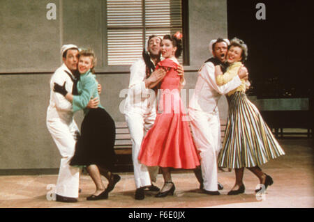 RELEASE DATE: December 30, 1949. MOVIE TITLE: On the Town. STUDIO: Metro-Goldwyn-Mayer (MGM). PLOT: Three sailors - Gabey, Chip and Ozzie - let loose on a 24-hour pass in New York and the Big Apple will never be the same! Gabey falls head over heels forMiss Turnstiles of the Month (he thinks she's a high society deb when she's really a 'cooch dancer at Coney Island); innocent Chip gets highjacked (literally) by a lady cab driver; and Ozzie becomes the object of interest of a gorgeous anthropologist who thinks he's the perfect example of aprehistoric man. Wonderful music and terrific shot Stock Photo