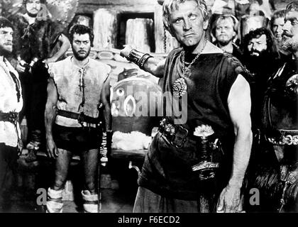 RELEASE DATE: June 28, 1958. MOVIE TITLE: The Vikings. STUDIO: Curtleigh Productions. PLOT: Einar and Eric are two Viking half-brothers. The former is a great warrior whilst the other is an ex-slave, but neither knows the true identity of the other. When the throne of Northumbria in Britain becomes free for the taking, the two brothers compete against one another for the prize, but they have very different motives - both involving the princess Morgana, however. PICTURED: KIRK DOUGLAS as Einar and TONY CURTIS as Eric. Stock Photo