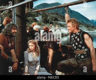 RELEASE DATE: June 28, 1958. MOVIE TITLE: The Vikings. STUDIO: Curtleigh Productions. PLOT: Einar and Eric are two Viking half-brothers. The former is a great warrior whilst the other is an ex-slave, but neither knows the true identity of the other. When the throne of Northumbria in Britain becomes free for the taking, the two brothers compete against one another for the prize, but they have very different motives - both involving the princess Morgana, however. PICTURED: KIRK DOUGLAS as Einar. Stock Photo