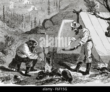 USA. Gold Rush. 19th century. Gold prospectors cook at the camp by night. Engraving at 'Harper's Weekly', 1857. Stock Photo