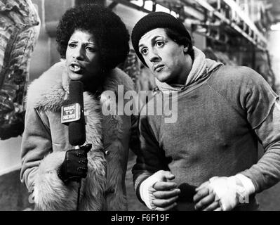 Film Title:  ROCKY.  DIRECTOR John G. Avildsen.  STUDIO:  United Artists.  PLOT:  The action-packed, crowd-pleasing story, shot mostly on location, tells of the rise of a small-time, underdog Philadelphia boxer, Rocky Balboa (Sylvester Stallone) against insurmountable odds in a big-time bout with Apollo Creed (Carl Weathers), with the emotional support of a shy,  loving girlfriend named Adrian (Talia Shire), and wily fight manager Mickey (Burgess Meredith). PICTURED:  SYLVESTER STALLONE. Stock Photo