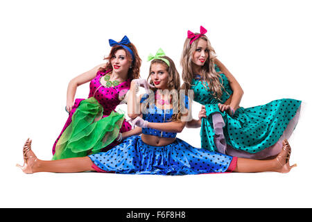 Female disco dancers showing some movements against isolated white Stock Photo