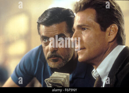 RELEASE DATE: November 22, 1985   MOVIE TITLE: Fever Pitch   DIRECTOR: Richard Brooks  STUDIO: MGM   PLOT: An investigative journalist gets hooked on the subject of his inquiry - organized gambling  PICTURED: GIANCARLO GIANNINI as Charley and RYAN O'NEAL as Steve Taggart  (Credit Image: c MGM/Entertainment Pictures) Stock Photo