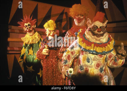 RELEASE DATE: May 27, 1988. MOVIE TITLE: Killer Klowns from Outer Space. STUDIO: MGM. PLOT: When a small town is invaded by aliens from outer space who are capturing and killing the townspeople, no one takes them seriously. Why? The aliens all look like circus clowns, use weapons that look clown like, and all have painted on smiles. Only a few of the young people in the town realize the danger and of course no one believes them. Armed with an ice cream truck they try and rescue their friends. PICTURED: Scene of the film. Stock Photo