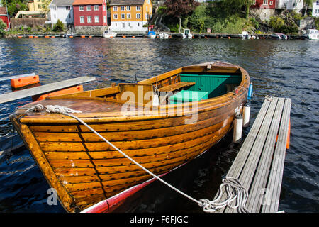 Wooden boat moored in Arendal Stock Photo