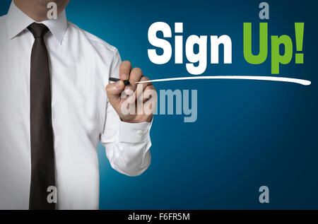 sign up is written by businessman background concept. Stock Photo