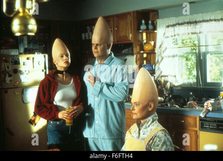 RELEASE DATE: July 23, 1993. MOVIE TITLE: Coneheads. STUDIO: Paramount Pictures. PLOT: An alien couple with cone-shaped heads from the planet 'Remulak' is mistakingly ditched on earth. While waiting to be recalled to their mother planet, they start a family and have a little daughter. They try to adapt to earth customs by living in middle-class suburbia. Meanwhile, their daughter grows up to be a teenager who has difficulties fitting in with her peers or accepting the fact that at some point, she has to return to 'Remulak' with the rest of the family. PICTURED: MICHELLE BURKE as Connie Conehea Stock Photo