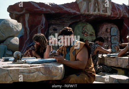 May 27, 1994; Hollywood, CA, USA; JOHN GOODMAN (right) as Fred Flintstone in the family, fantasy, comedy ''The Flintstones'' directed by Brian Levant. Stock Photo