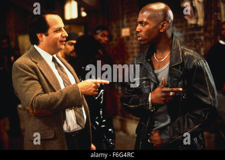 RELEASE DATE: October 25, 1996. MOVIE TITLE: High School High. STUDIO: TriStar Pictures. PLOT: Richard Clark has just left the well-known Wellington Academy to teach at Marion Barry High School. Now, he will try to inspire the D-average students into making good grades and try to woo a fellow teacher. PICTURED: JON LOVITZ as Richard Clark and MEKHI PHIFER as Griff McReynolds. Stock Photo