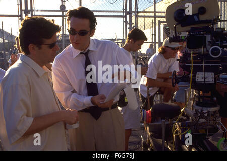 Jun 06, 1997; Los Angeles, CA, USA; Actor JOHN CUSACK with director SIMON WEST on the set of 'Con Air.'
