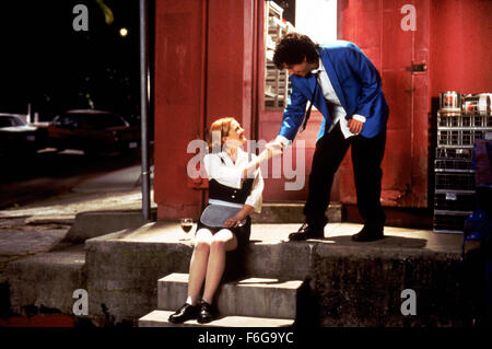 RELEASE DATE: 13 February 1998. MOVIE TITLE: The Wedding Singer. STUDIO: New Line Cinema. PLOT: Robbie, the singer and Julia, the waitress are both engaged to be married but to the wrong people. Fortune intervenes to help them discover each other. PICTURED: DREW BARRYMORE as Julia and ADAM SANDLER as Robbie. Stock Photo