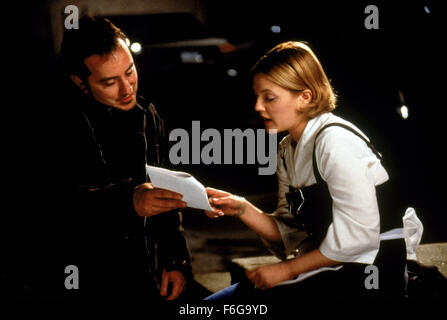 RELEASE DATE: 13 February 1998. MOVIE TITLE: The Wedding Singer. STUDIO: New Line Cinema. PLOT: Robbie, the singer and Julia, the waitress are both engaged to be married but to the wrong people. Fortune intervenes to help them discover each other. PICTURED: Director FRANK CORACI and DREW BARRYMORE as Julia. Stock Photo