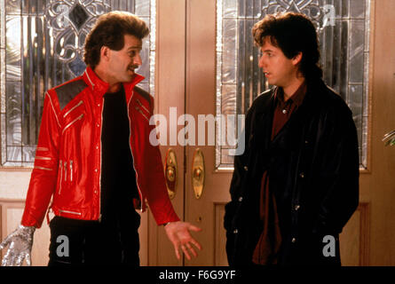 RELEASE DATE: 13 February 1998. MOVIE TITLE: The Wedding Singer. STUDIO: New Line Cinema. PLOT: Robbie, the singer and Julia, the waitress are both engaged to be married but to the wrong people. Fortune intervenes to help them discover each other. PICTURED: ALLEN COVERT as Sammy and ADAM SANDLER as Robbie. Stock Photo