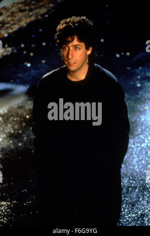 RELEASE DATE: 13 February 1998. MOVIE TITLE: The Wedding Singer. STUDIO: New Line Cinema. PLOT: Robbie, the singer and Julia, the waitress are both engaged to be married but to the wrong people. Fortune intervenes to help them discover each other. PICTURED: ADAM SANDLER as Robbie. Stock Photo