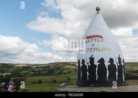 White Nancy in Bollington Cheshire displaying the Battle of Waterloo decoration. The monument is on the Gritstone trail Stock Photo