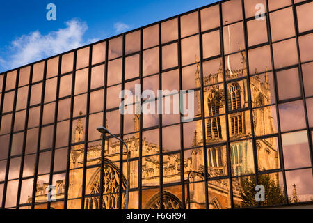 UK, England, Yorkshire, Hull, Market Place, Holy Trinity Church reflected in windows Stock Photo